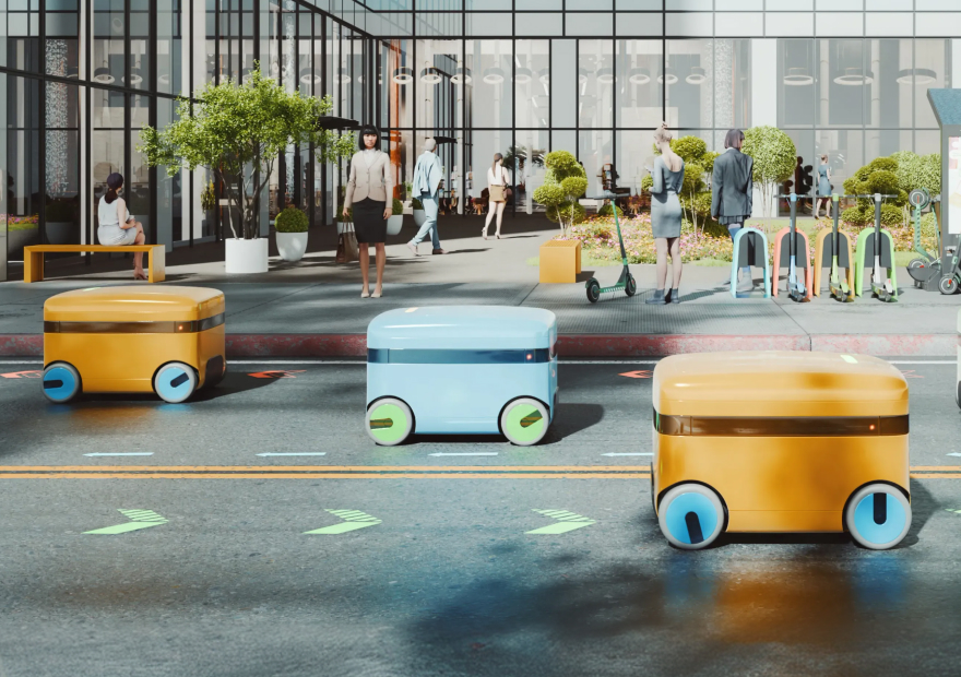 Orange und blaue Liefer Roboter auf einer Straße vor einem modernen Gebäude